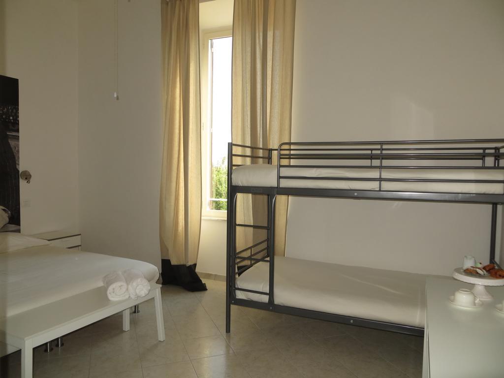 5 Rooms Affittacamere ชิวิตาเวกเกีย ห้อง รูปภาพ
